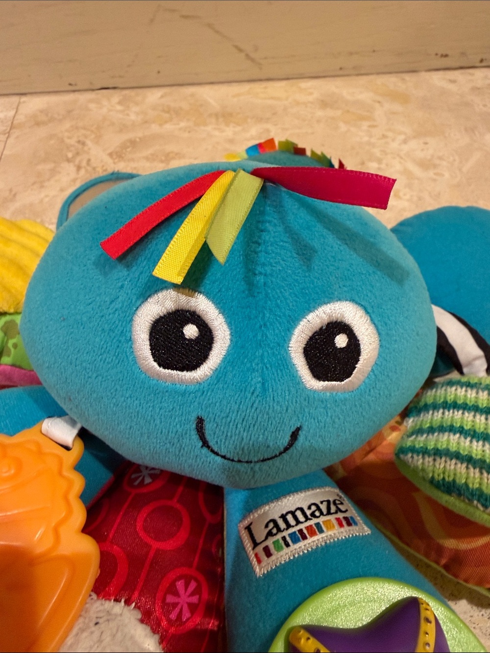 Lamaze Teal Octopus Sensory Plush with Multicolor Texture Petals